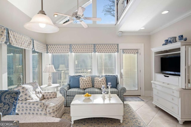 tiled living room featuring ceiling fan and ornamental molding