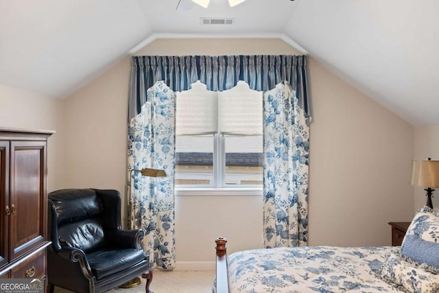 bedroom with carpet floors, ceiling fan, and lofted ceiling