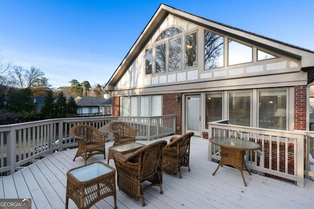 wooden deck with an outdoor hangout area