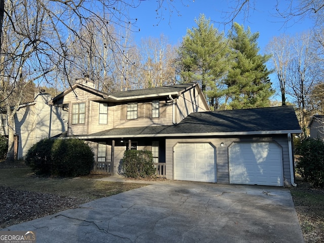 exterior space with a porch and a garage