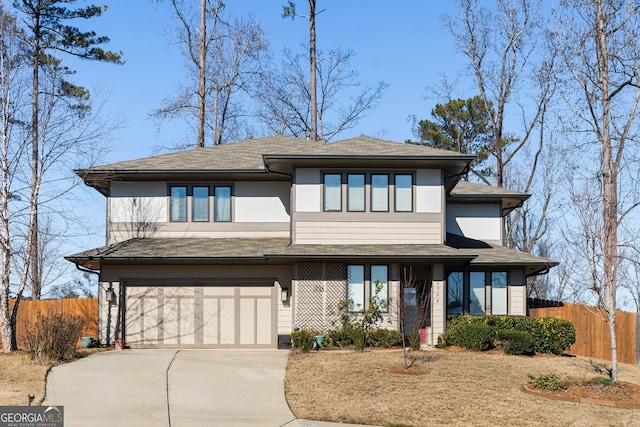 prairie-style house featuring a garage