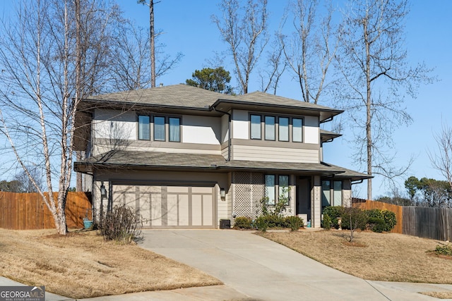 view of front of property with a garage