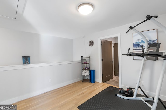 exercise area with hardwood / wood-style floors