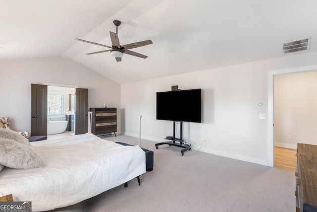 carpeted bedroom with ceiling fan and lofted ceiling