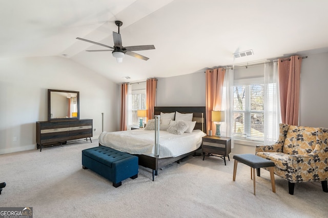 bedroom featuring ceiling fan, light colored carpet, and lofted ceiling