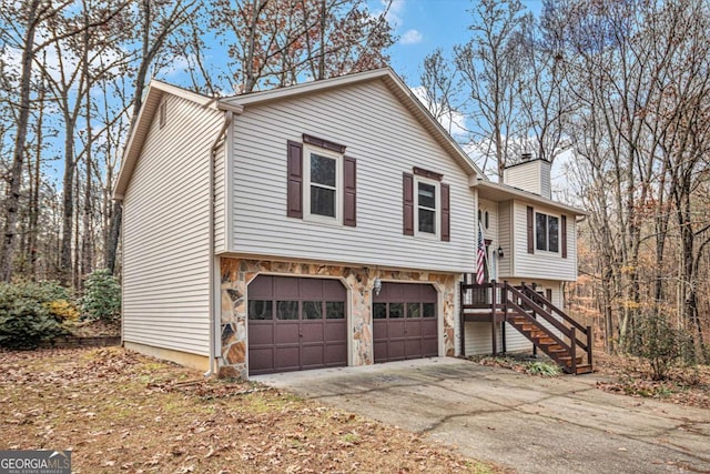 raised ranch featuring a garage