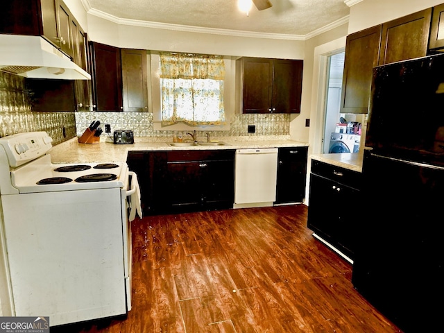 kitchen featuring backsplash, white appliances, dark wood-type flooring, washer / clothes dryer, and sink