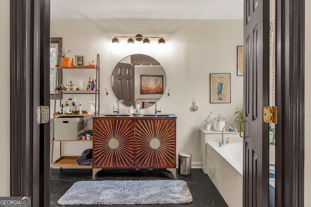 bathroom featuring tile patterned floors, vanity, and a tub