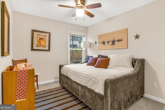 bedroom featuring carpet and ceiling fan