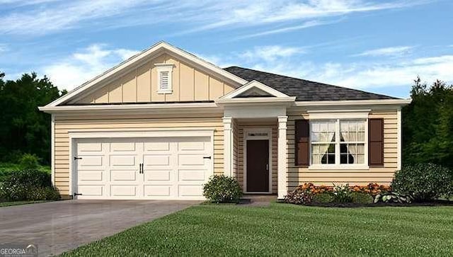 view of front facade featuring a front lawn and a garage