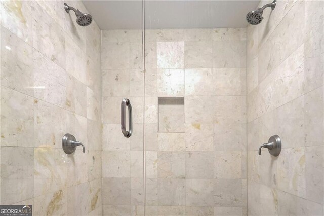 bathroom with an enclosed shower