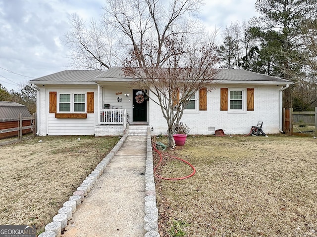 ranch-style house with covered porch