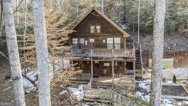 view of front of property featuring a wooden deck