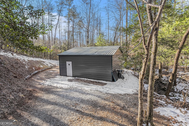 view of property exterior with a wooden deck