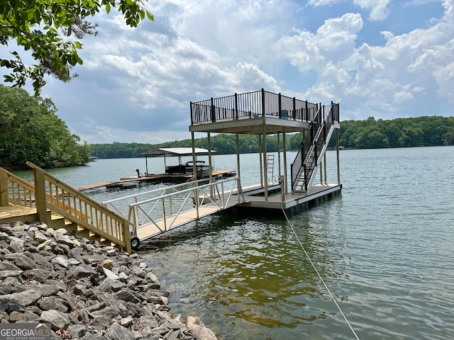 view of dock with a water view