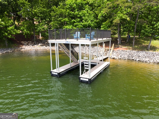 dock area with a water view