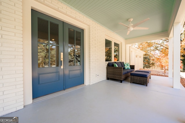 view of patio with french doors and ceiling fan