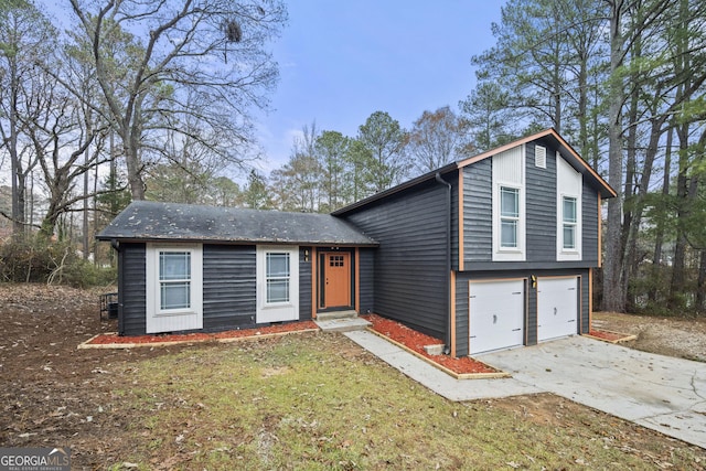 split level home featuring a garage