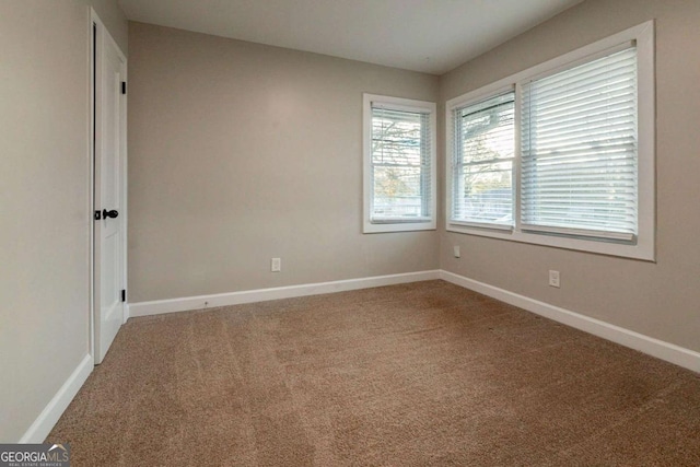 spare room with carpet flooring