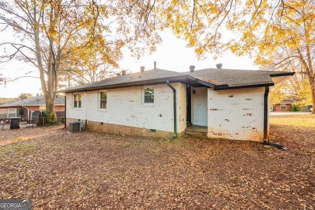 back of property with cooling unit