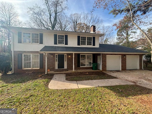 view of front property featuring covered porch, a garage, and a front lawn