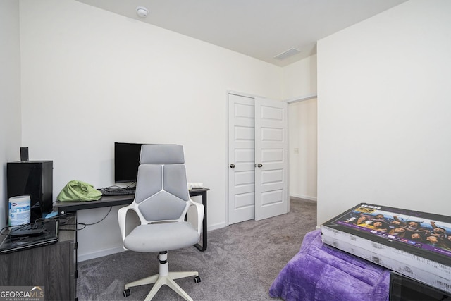 9004 Jim Purcell Dr, Covington, GA 30014 - carpeted bedroom with an office area and baseboards