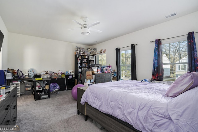 carpeted bedroom with ceiling fan