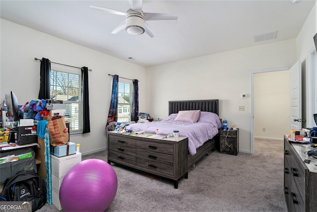 carpeted bedroom featuring ceiling fan