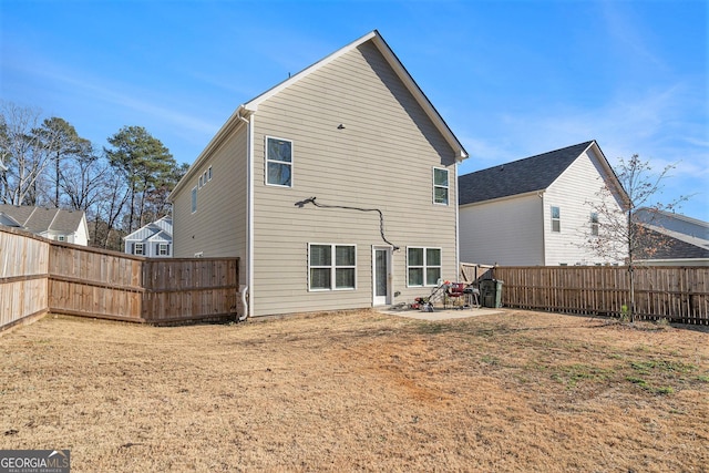 back of property with a patio area