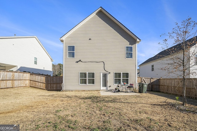 back of house featuring a patio area