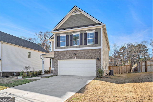 9004 Jim Purcell Dr, Covington, GA 30014 - view of front of house with an attached garage, board and batten siding, driveway, and brick siding