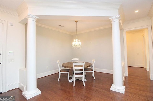 dining space featuring wood finished floors, decorative columns, baseboards, recessed lighting, and a chandelier