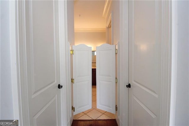 hall with light tile patterned floors