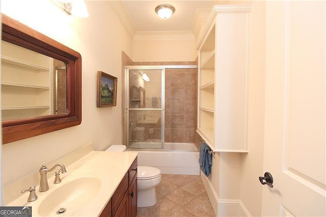 full bath with crown molding, toilet, vanity, combined bath / shower with glass door, and tile patterned flooring