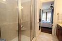 bathroom with a stall shower