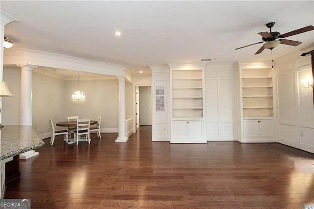living area featuring dark wood-type flooring, ceiling fan, crown molding, decorative columns, and recessed lighting