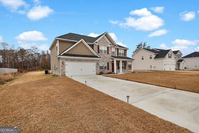 view of front of house featuring cooling unit and a front lawn