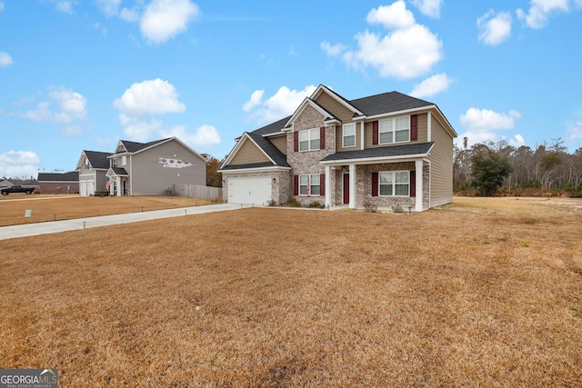 view of front facade featuring a garage and a front lawn