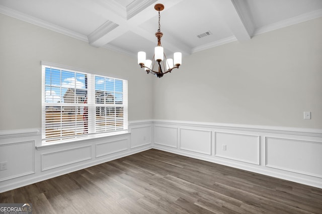 unfurnished room featuring beam ceiling, crown molding, a chandelier, and dark hardwood / wood-style floors