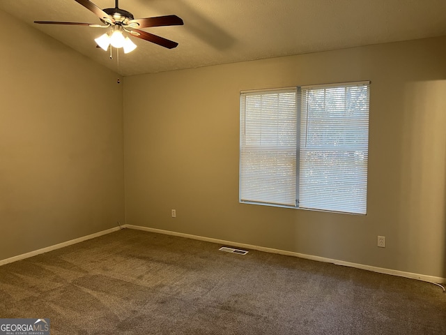 6268 Marbut Farms Trl, Lithonia, GA 30058 - unfurnished room featuring a ceiling fan, dark colored carpet, and lofted ceiling