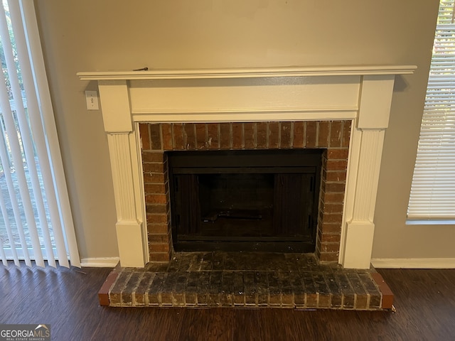 6268 Marbut Farms Trl, Lithonia, GA 30058 - detailed view of a fireplace and wood finished floors