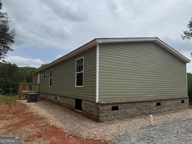 132 Wauka Mountain Rd, Clermont, GA 30527 - view of home's exterior with crawl space and central AC