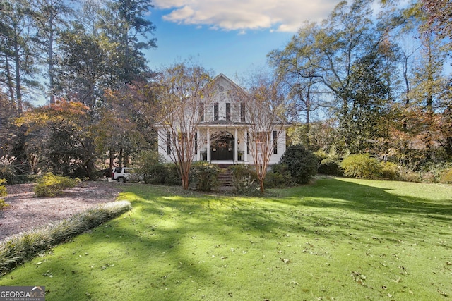 view of front of property with a front lawn