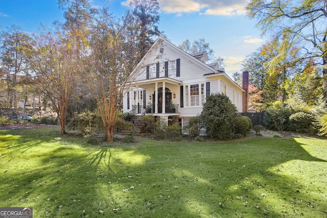 exterior space featuring a front lawn