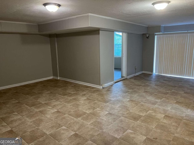 basement featuring a textured ceiling