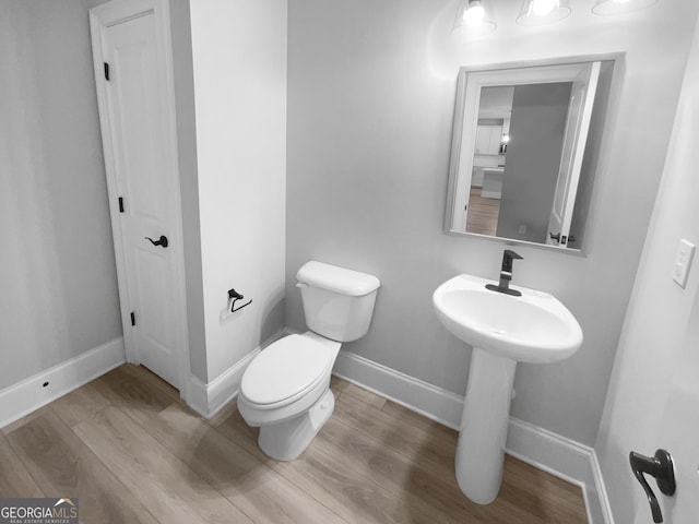 422 Mcdaniel Pl, Canton, GA 30115 - half bath with wood finished floors and toilet