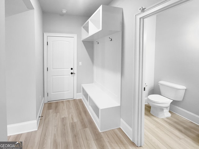 mudroom with light hardwood / wood-style flooring