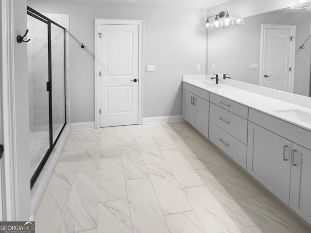 bathroom featuring vanity and an enclosed shower