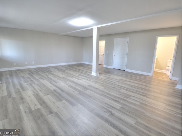 spare room with light hardwood / wood-style floors