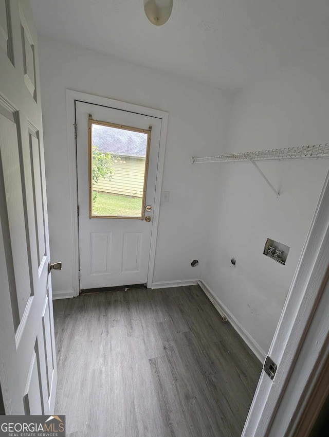 laundry room with washer hookup, dark hardwood / wood-style floors, and hookup for an electric dryer